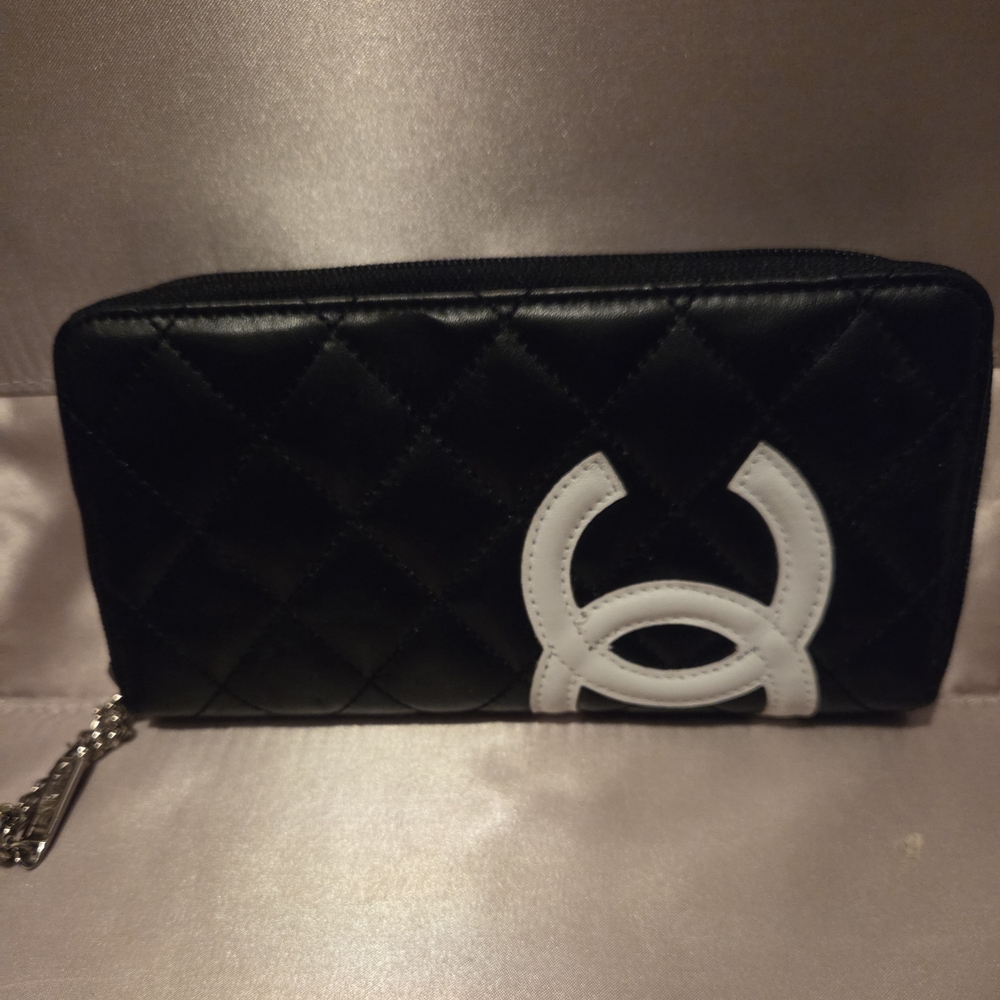 Chic Black Quilted Wallet with White Accent
